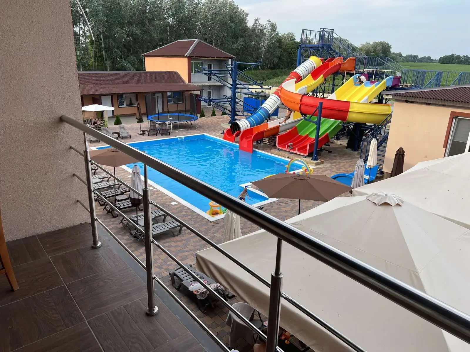 Recreation complex for living. 3 floors, the area of one floor was 400 sq.m. The difficulty was that it was a reconstruction of already existing industrial premises. It was necessary to take into account the existing structures of supporting structures. Take into account their condition and reliability.